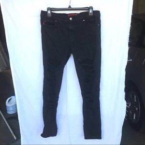 Black ripped jeans with mesh